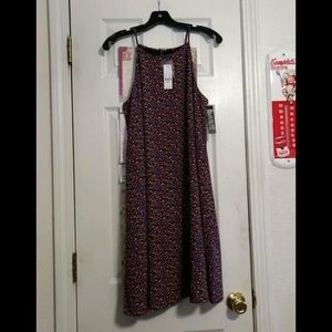 New with tags. Lightweight fully lined dress. Med